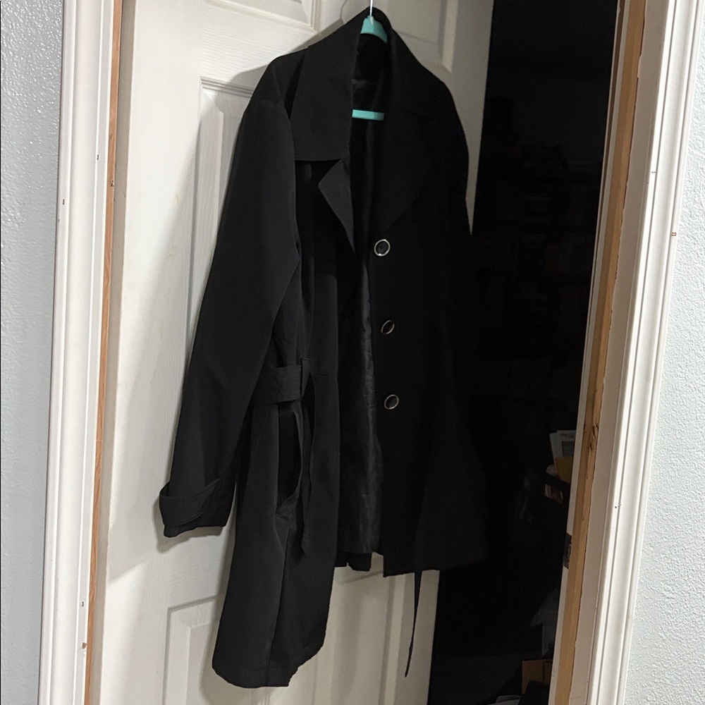 London Fog Women’s Black Trench Coat goes almost to knees